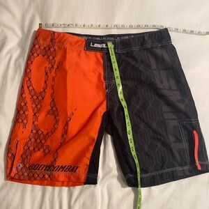 Les Mills Body Combat vintage shorts L black/orange (excellent condition)